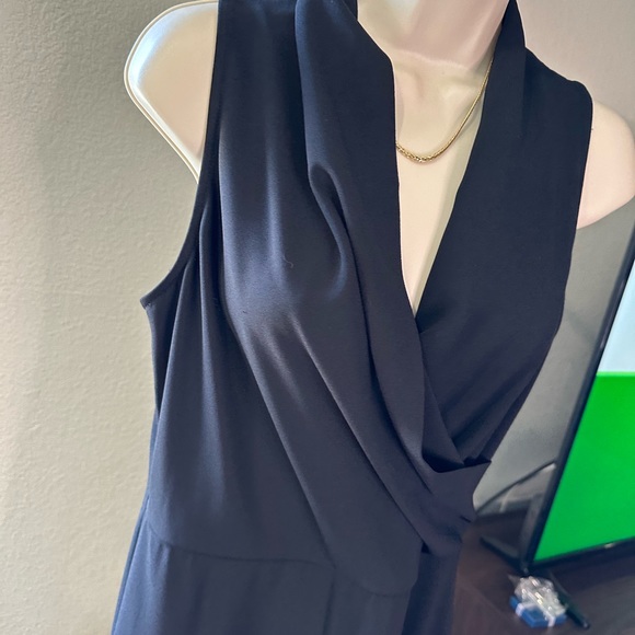 cupcakes and cashmere Black jumpsuit. Wide leg, wrap top. Great for any event! - Picture 3 of 7